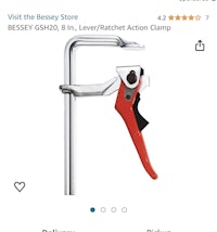 a picture of a tool with a red handle on it